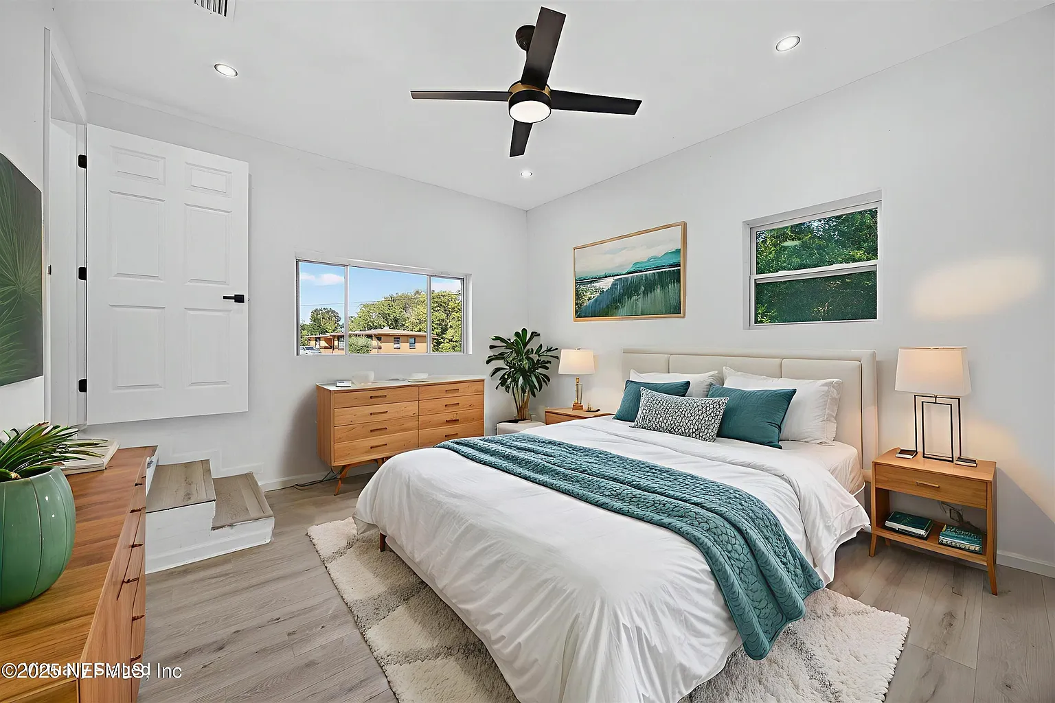 Serene primary bedroom with natural light